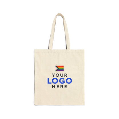 Natural cotton tote bag printed with a company logo and the Progress Pride flag for corporate Pride Month gifting