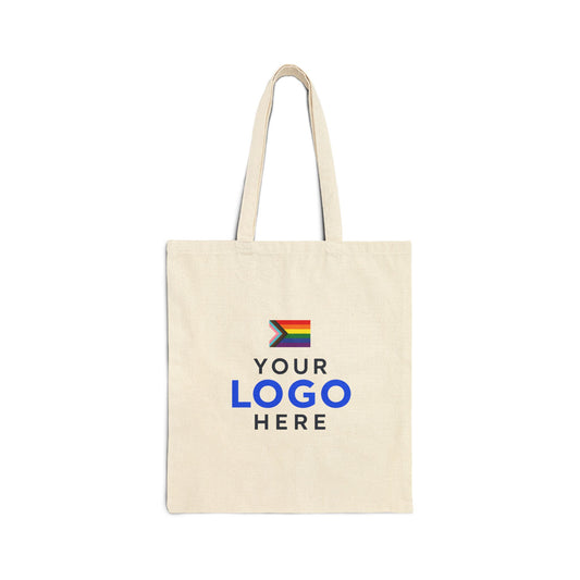 Natural cotton tote bag printed with a company logo and the Progress Pride flag for corporate Pride Month gifting