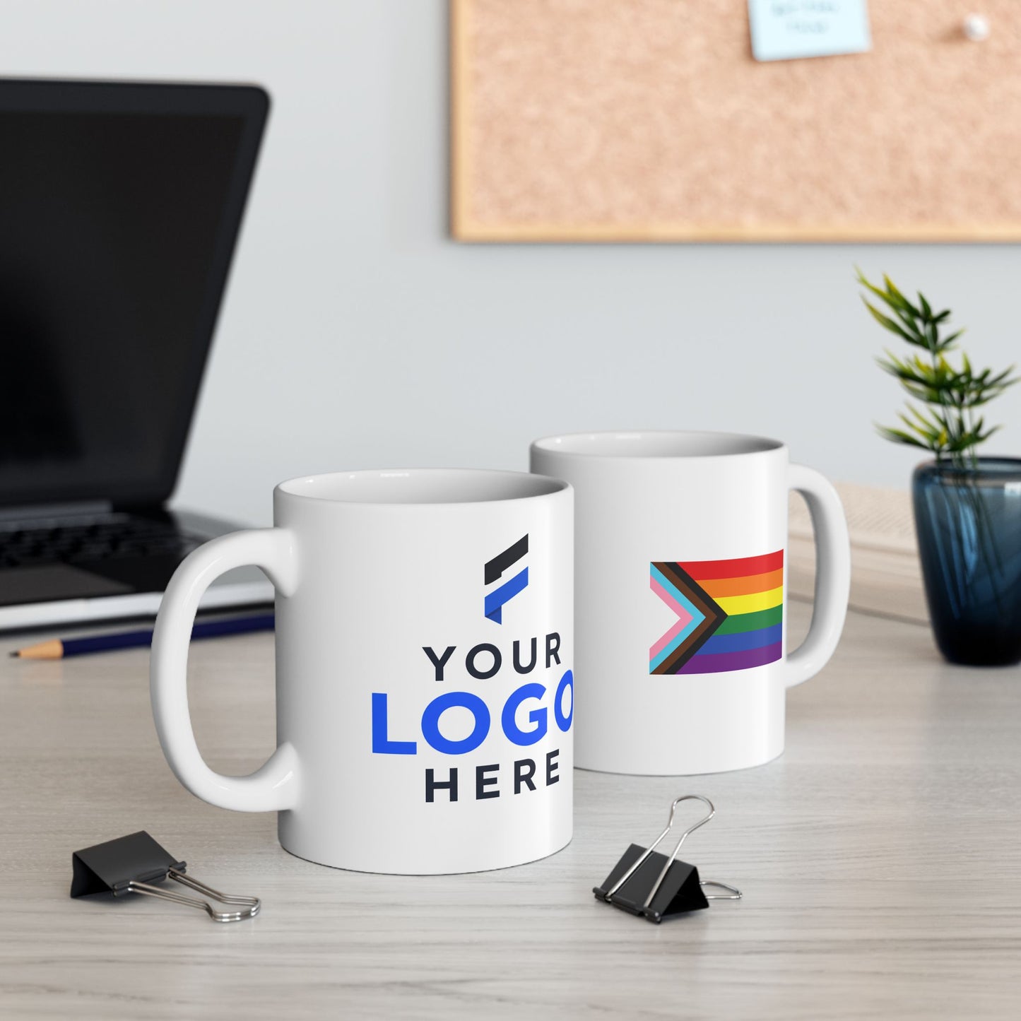 Ceramic mug with a company logo on the front and the Progress Pride flag on the back for corporate Pride Month gifting