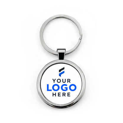 Round metal keychain printed with a company logo for corporate branding